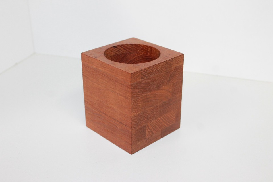 A chunky end-grain teak cube pen holder with gorgeous MCM staved construction — the kind of thing a 1960s architect kept on his drafting table.