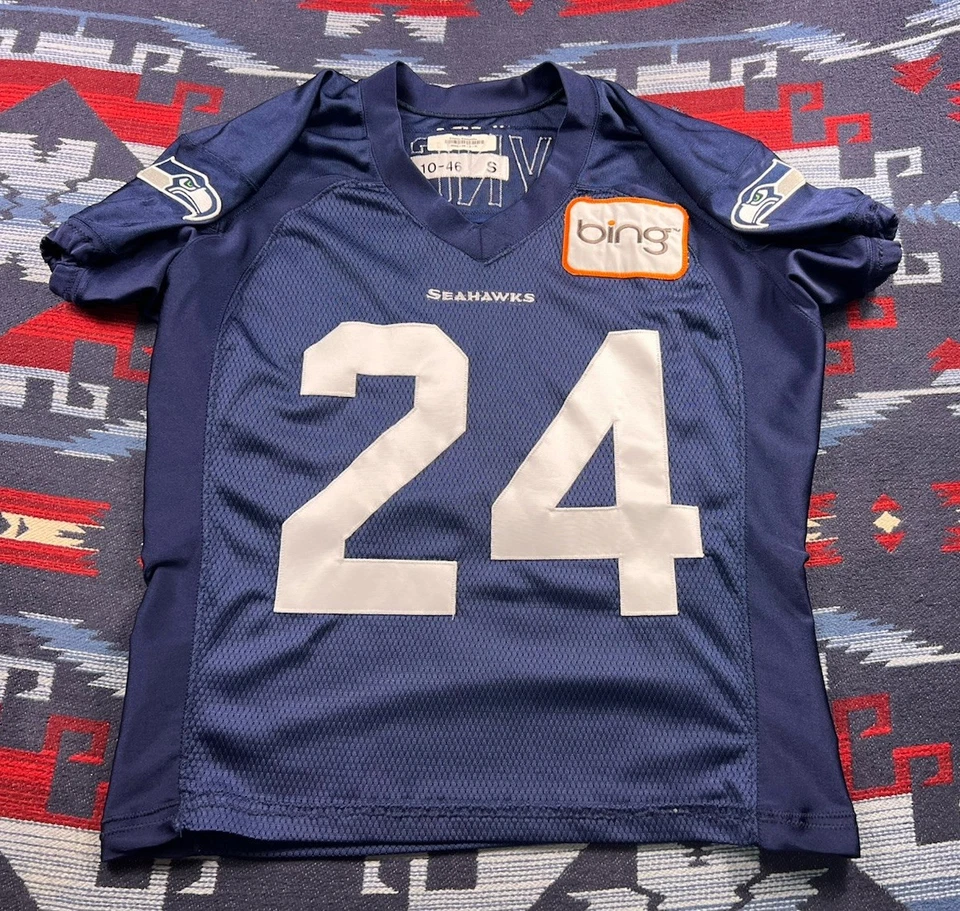 Camiseta deportiva de práctica de campamento de entrenamiento emitida por el equipo Reebok Seattle Seahawks Marshawn Lynch Foto 2 de 4