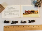 4 METAL LOCOMOTIVE MODELS and (unrelated) BOOKLET showing wood locomotive models — photo 4