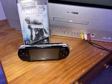 Psp 1000 Black, With 1gb Memory Stick, Assassins Creed Bloodline With Case