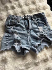 Preowned, Almost Famous light wash , distressed denim shorts, size 0