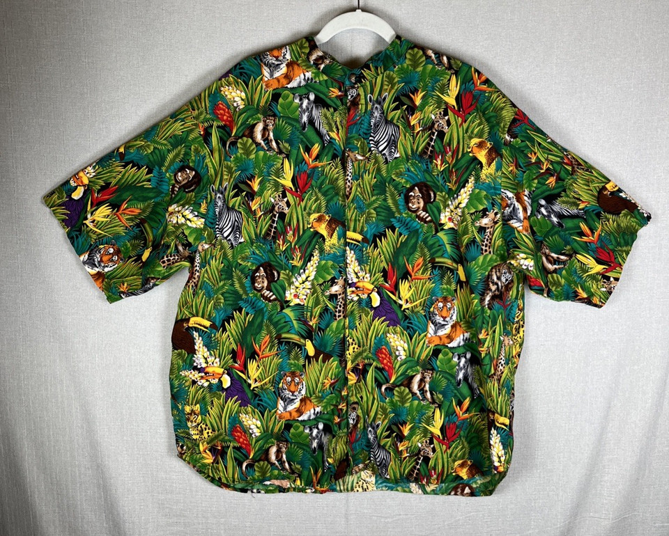 A big, gloriously loud vintage safari/jungle Aloha shirt — the kind of statement piece that wins every ugly-shirt party and then becomes a personality.