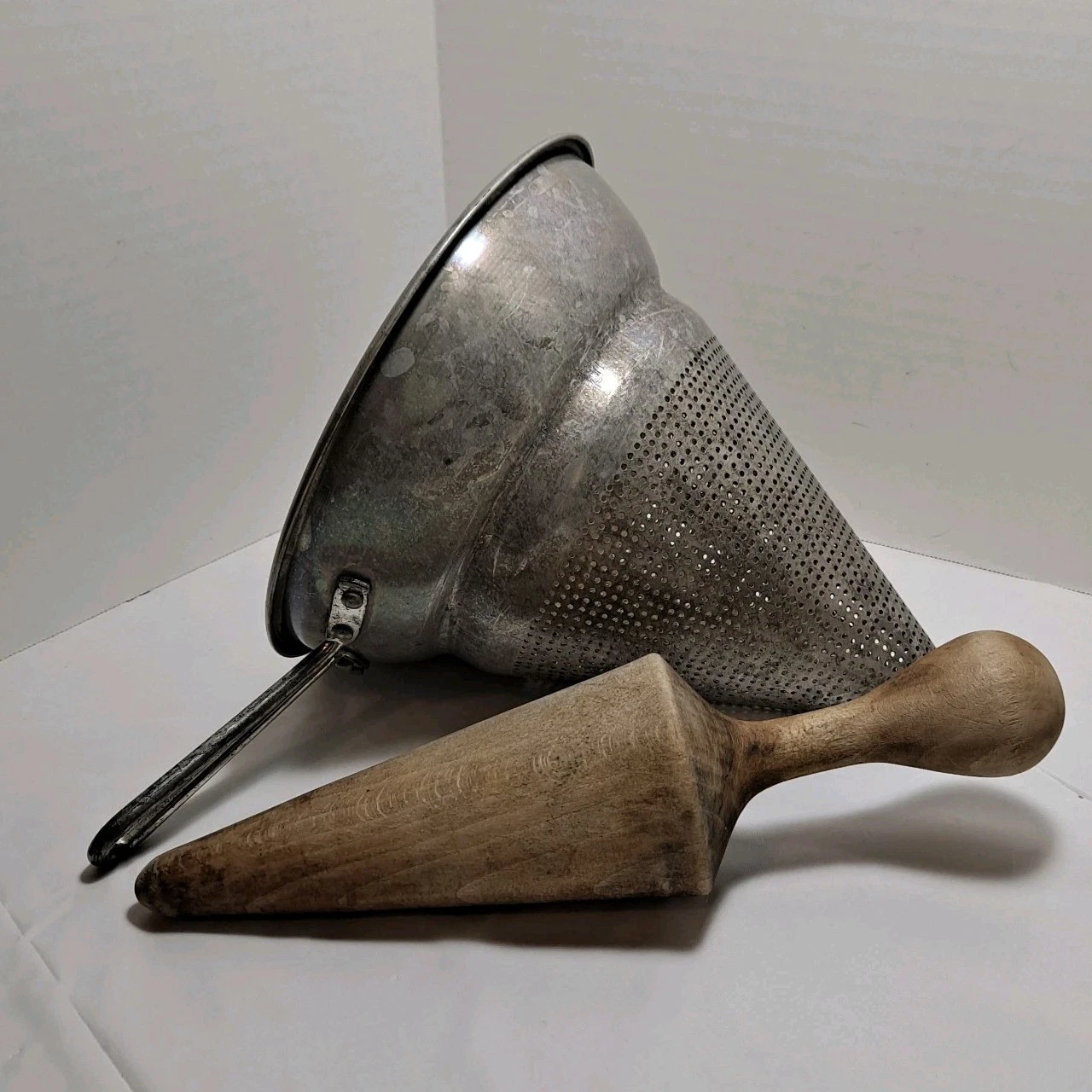Vintage Cone Metal Canning Strainer & Primitive Wooden Cone Shaped Pestle
Opens in a new window or t