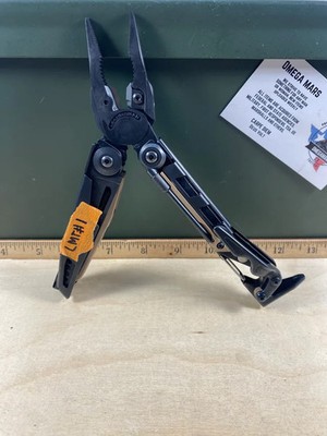 Leatherman Mut LMT#1. Looks/feel brand new except show signs of improper carry.