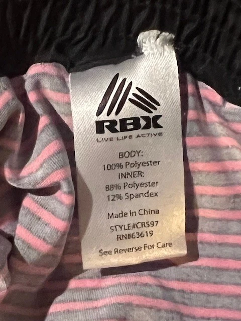 Pantalones Cortos de Correr 2 en 1 para Mujer RBX Talla L - Negros con Acentos Rosa y Forro a Rayas Foto 4 de 4