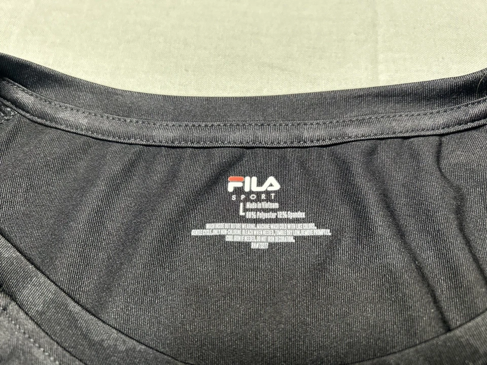 Camiseta deportiva FILA para mujer negra elástica bolsillo trasero talla grande estampado de leopardo Foto 2 de 4