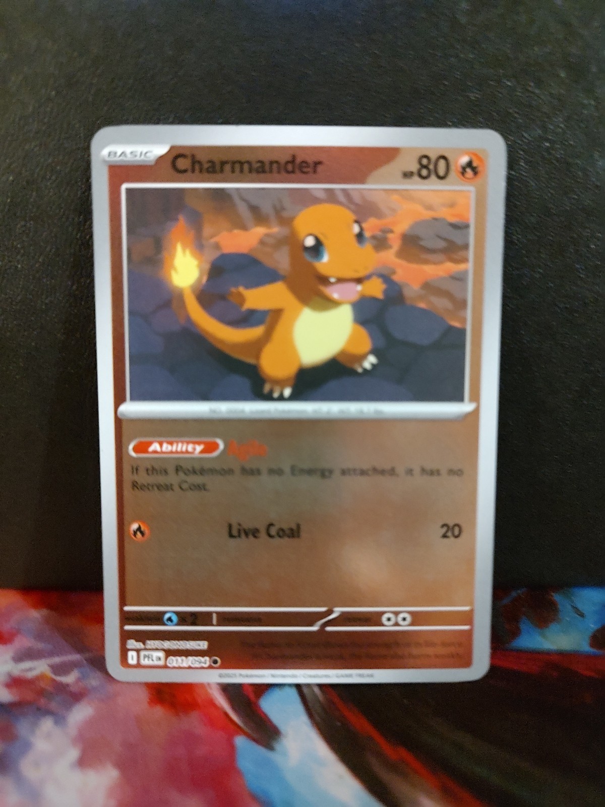 Charmander 011/094 Me02: Phantasmal Flames Reverse Holo