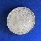 1884-O Morgan Silver Dollar having XF+ details and a nice coin.