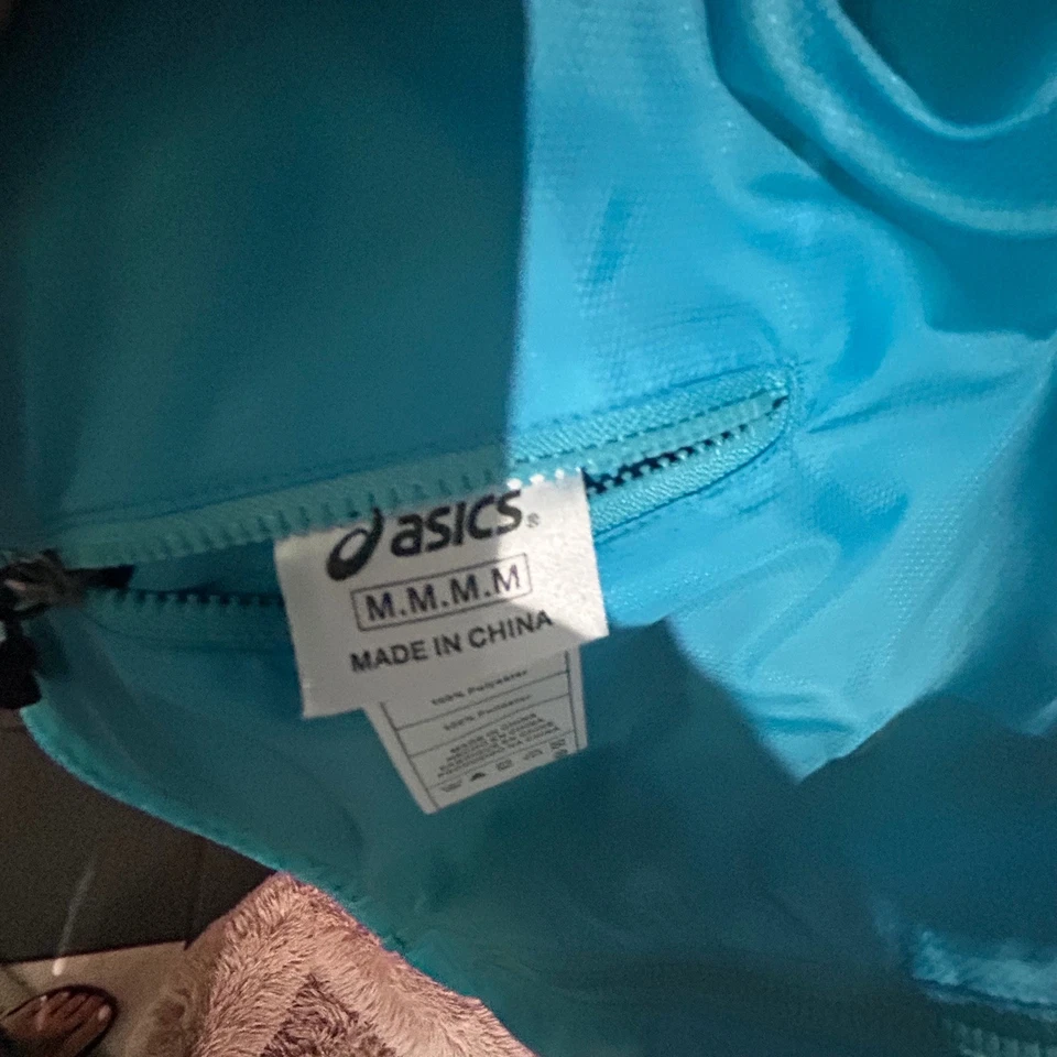 Chaleco reversible para mujer Asics con capucha cremallera completa entrenamiento correr mediano Foto 3 de 4