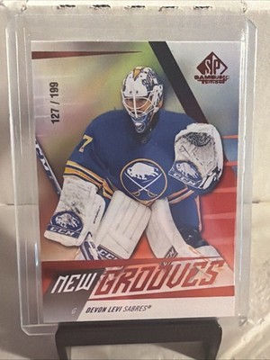 Devon Levi 2023-24 SP Game Used New Grooves Red #NG9 127/199 Sabres
