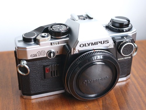 OLYMPUS OM10 35mm film SLR Camera Body w/ OM Manual Adapter - Picture 2 of 6