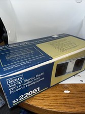 Vintage New Sears Am/Fm stereo radio with amplifier and personal headphones