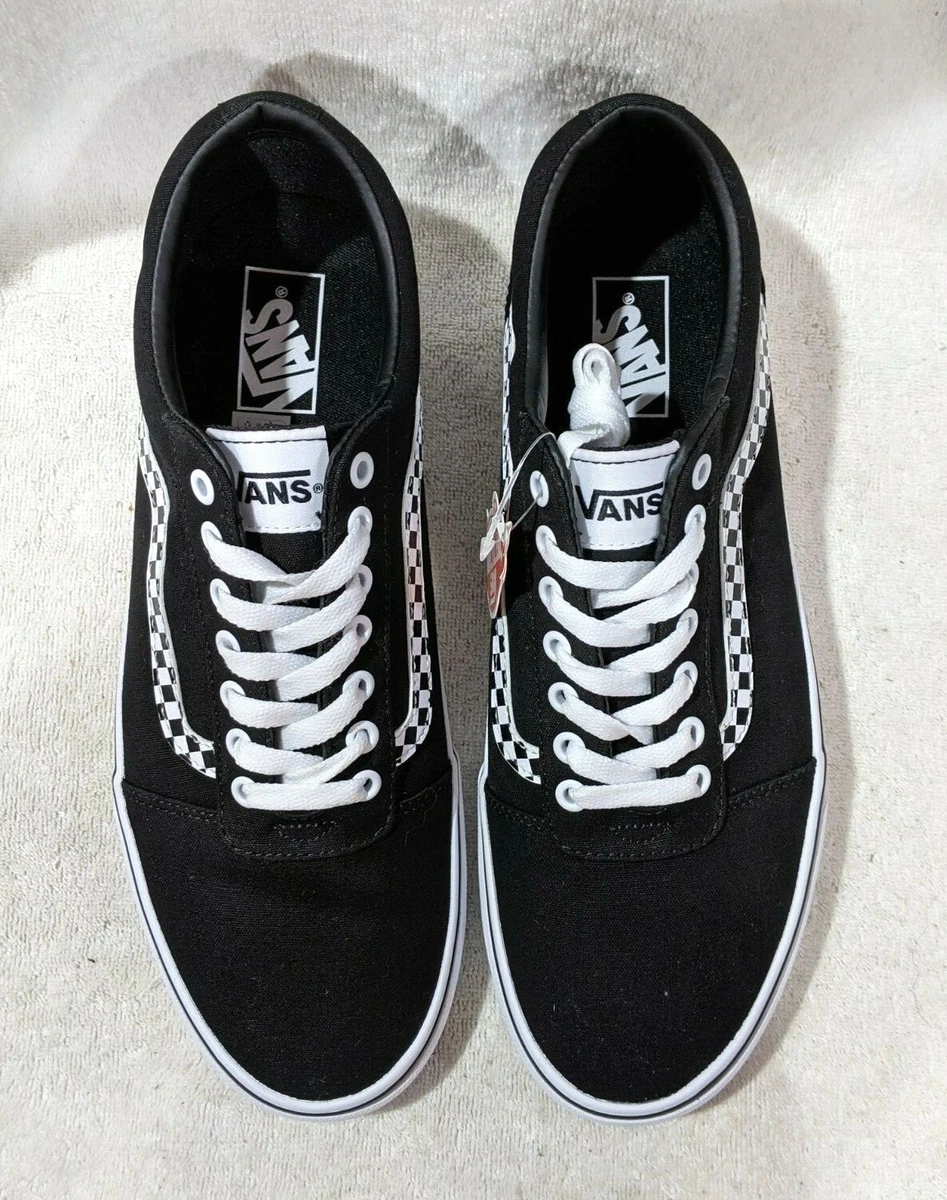 Black vans clearance with white stripe