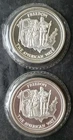 Two 1985 Johnson Matthey 1oz Silver Freedom Rounds in Plastics