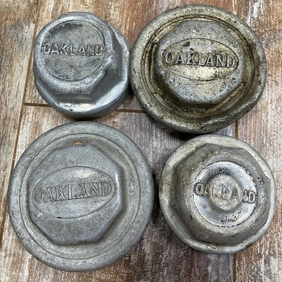 1920's Oakland Automobiles Embossed Hubcap Grease Caps Lot Of 4 Different Styles