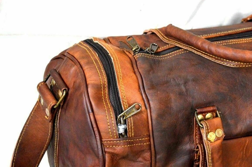 Premium Photo | A photo of a vintage leather travel bag