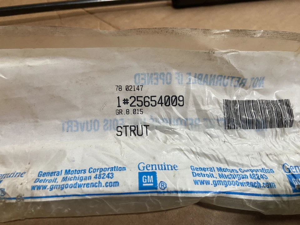 Puntal capó GM 25654009, lado izquierdo o derecho -- 1997 - 99 Cadillac DeVille Seville Foto 2 de 4