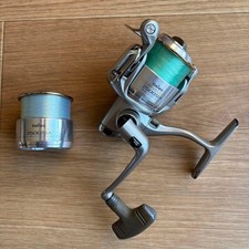 Mulinello da spinning Daiwa Tournament X 2500SiA con bobina e istruzioni