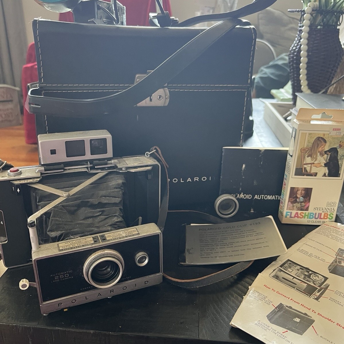 Polaroid 250 Land Camera- Original Case, Manual, Flash, Unopened Bulbs, Clip