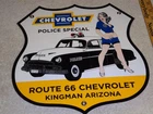 VINTAGE 1952 CHEVROLET WOMAN👵CHEVY BOWTIE GASOLINE OIL PORCELAIN METAL CAR SIGN