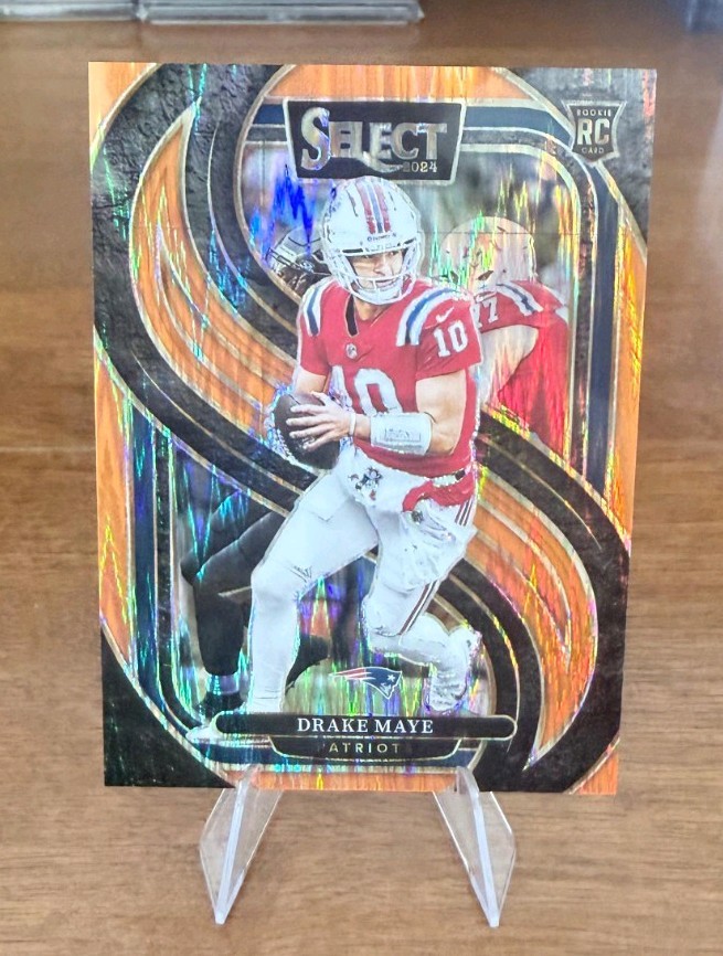 2024 Panini Select Drake Maye Premier Level Orange Shock /399 (RC) #113 Patriots
