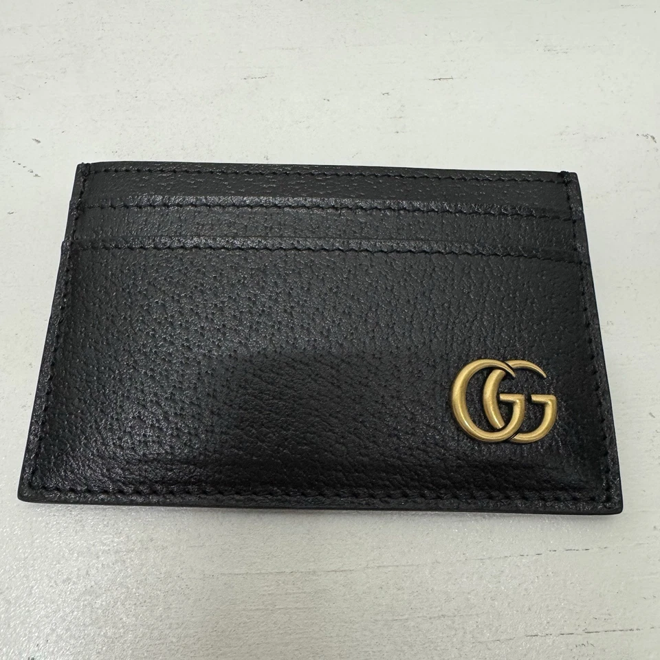 Tarjetero Gucci GG Marmont en dorado/negro Foto 2 de 4