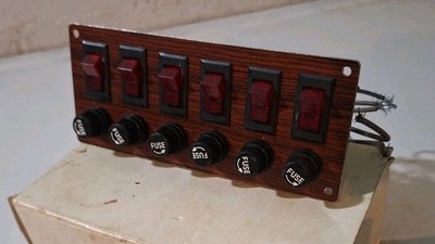 NOS Vtg 6 Rocker Switch Panel w/Fuses Faux Wood Grain Finish 12v