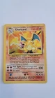 Wizards Pokémon TCG Charizard 4/102 Base Set Holo Rare 1999 English HP/Damaged
