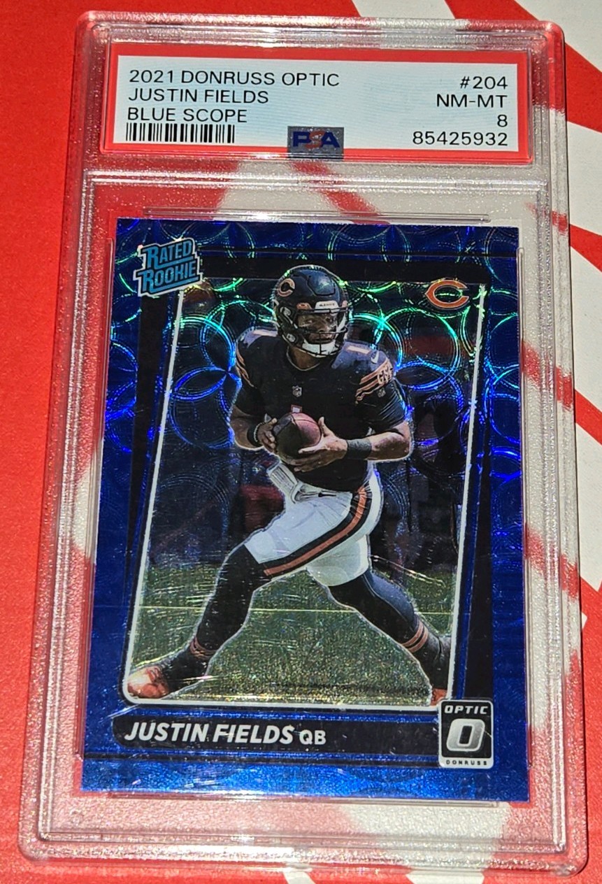 2021 Donruss Optic Justin Fields Blue Scope Rated Rookie #204 Bears PSA 8