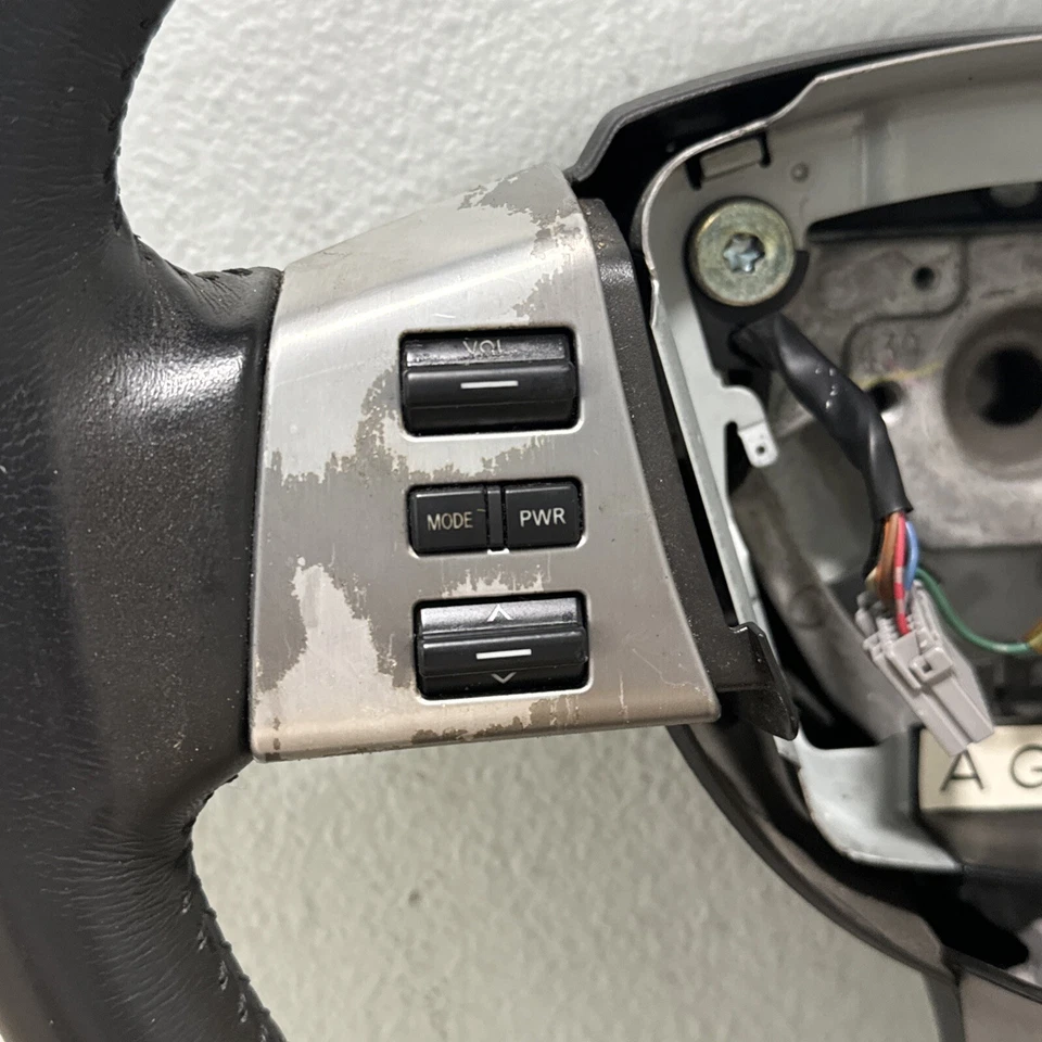 Nissan Murano 2003-2005 OEM volante de cuero con moldura de control negro Foto 3 de 4