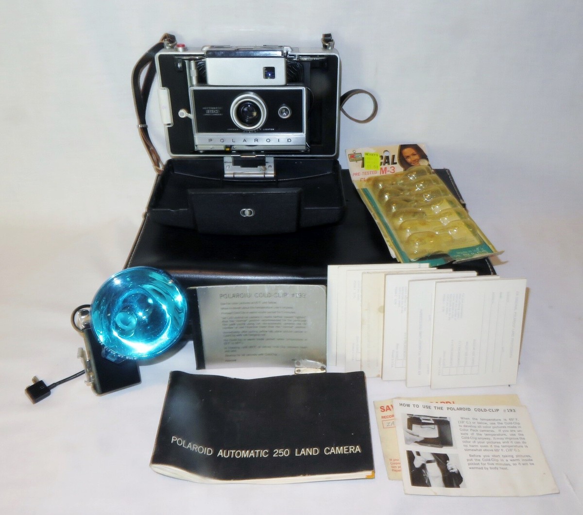 Polaroid 250 Land Camera With Case, Bulbs, Flash, Instructions, Cold Clip