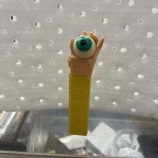 Vintage Flesh Colored Psychedelic Hand with Eye Purple Stem PEZ Candy Dispenser