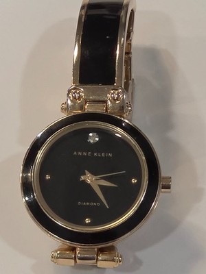 Anne Klein  Diamond  pre-owned good condition needs battery.
