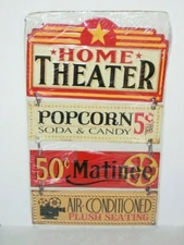 VTG Looking Embossed Home Theater Matinee Popcorn Metal Sign by Open Road Brands