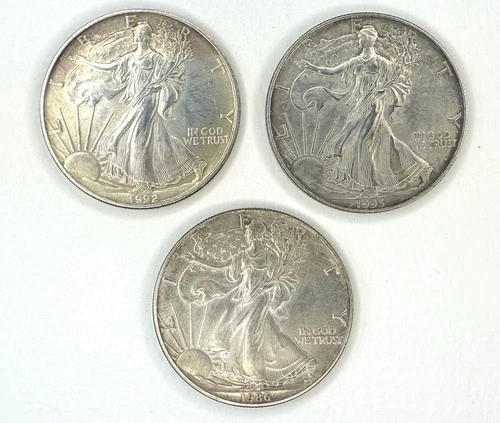 Three (3) American Silver Eagles, 1986, 1992, 1993 – 3 oz .999 Silver UNC Lot