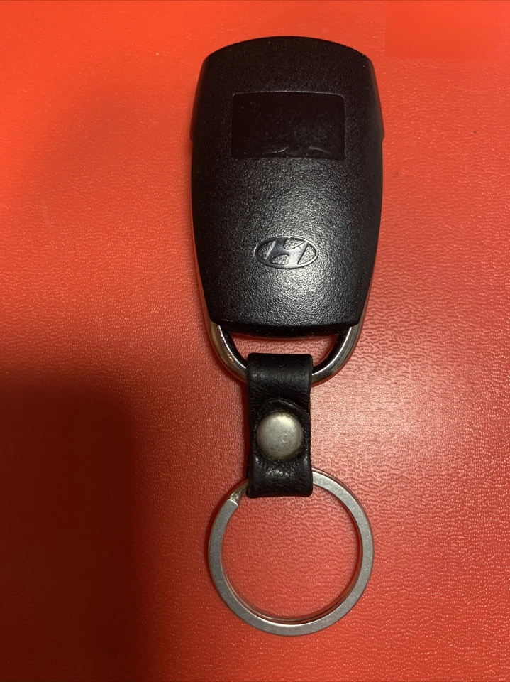 HYUNDAI ENTOURAGE 2007-09 entrada sin llave mando a distancia transmisor SV3-100060235 OEM Foto 2 de 3