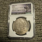 1884-O Morgan Silver 1oz  graded 63