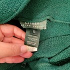 Close-up of Vtg 90s Ralph Lauren women’s green 1/4 zip pullover fleece sweater with collar and size label.