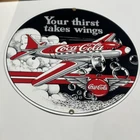 New ListingVintage Coca Cola Aviation Porcelain Sign “Your Thirst Takes Wings” 10”