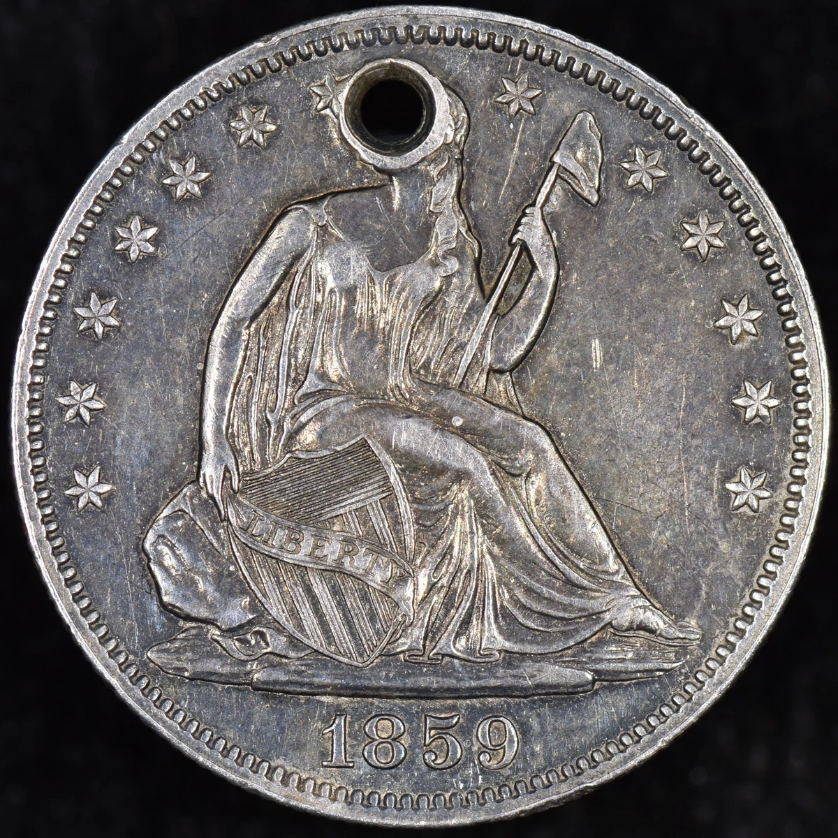 1859 Year Silver Seated Liberty US Half Dollars (1839-1891) for