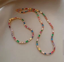 multi color round and baguette stone tennis bracelet and necklace set
