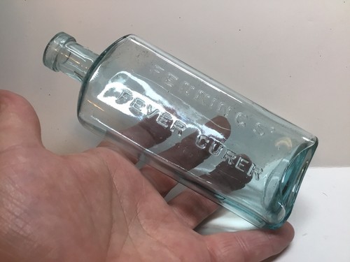 Antique Fenning’s Fever Curer Medicine Bottle.