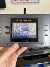 Atari Lynx Handheld Console Bundle with Carrying Case and 11 Games Manuals