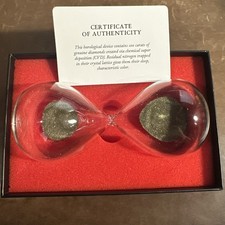 The Curiosity Box~ This Hourglass Contains 10...