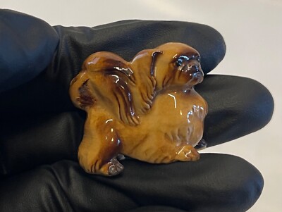 Brown Pekingese ceramic figurine, 1 1/2'' x 1 1/2''