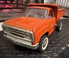 Vintage Tonka “Dodge” Pressed Steel Orange Dump Truck Toy Vehicle Collectible