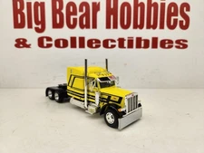 DCP 1/64 "Harrison" Yellow/Blk Graphics 379 Peterbilt 63" Mid Roof Sleeper