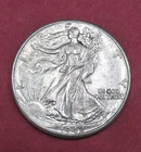 1942 Walking Liberty Half Dollar Double Die Reverse, uncirculated condition.
