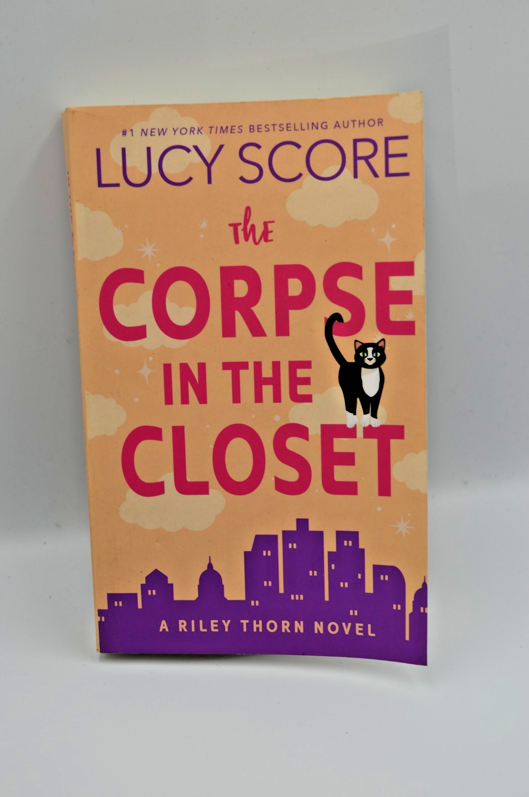 The corpse in the closet by Lucy Score   (A)