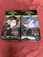 Lot Of 2 NEW Christmas EZ-Illuminations Holiday Led Projector Santa & Snowman